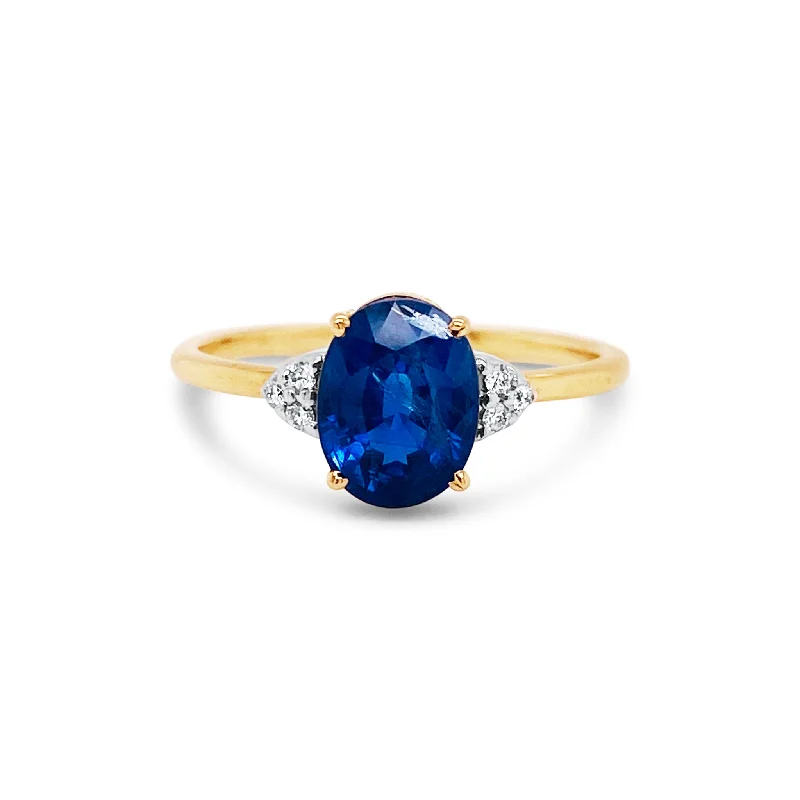 Blue Sapphire Oval And Diamond Ring In 18K Yellow Gold